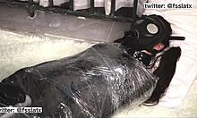 Hardcore bondage and gasmask play with a Japanese amateur woman in latex catsuit